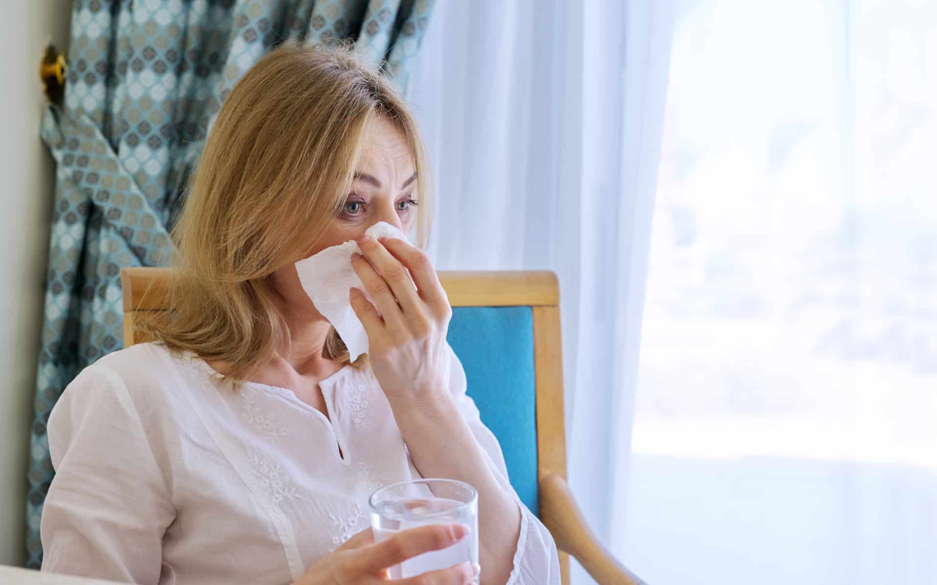 A lady suffering a cold on a cruise ship.