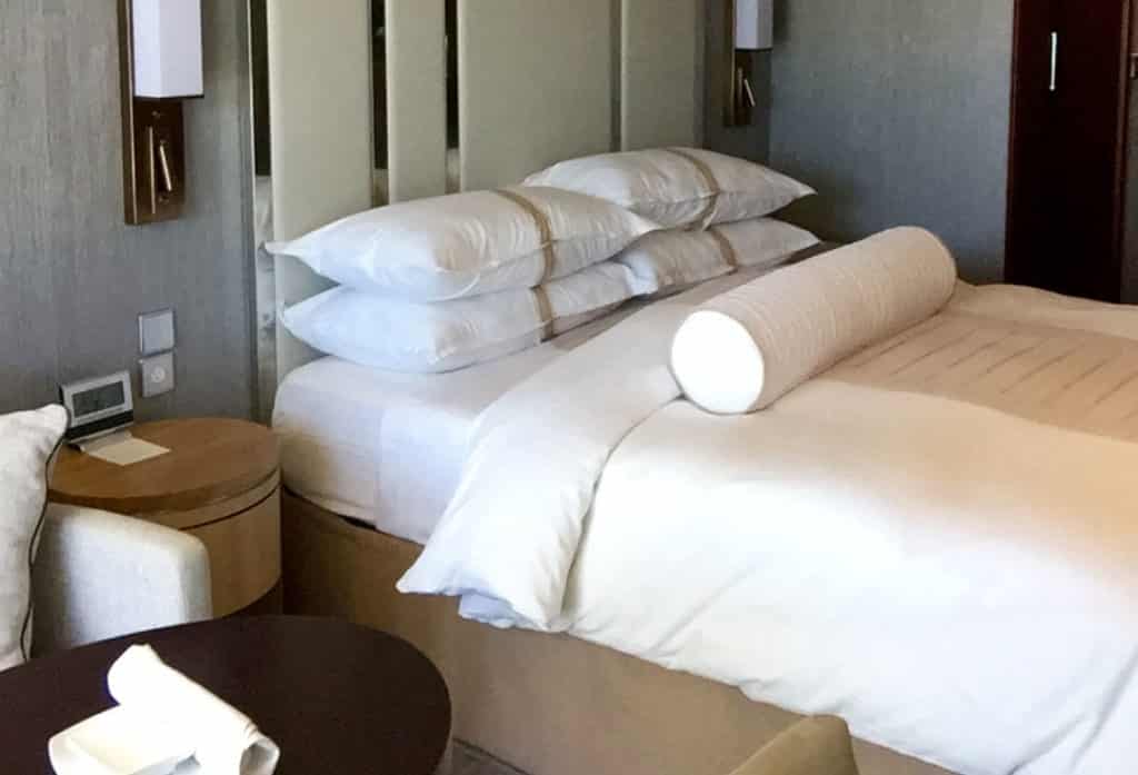 The living space of an Azamara Quest Club Deluxe Veranda Stateroom.