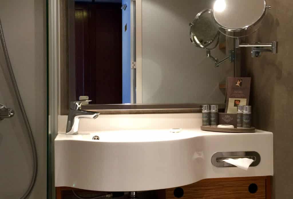 The bathroom in an Azamara Quest Club Veranda Stateroom.