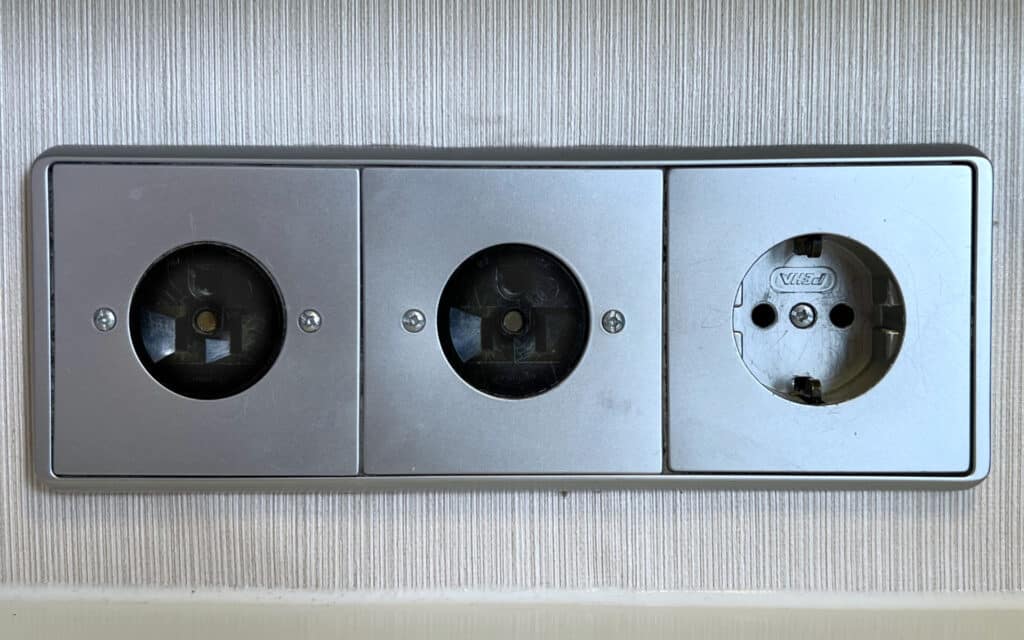 Power outlets in a Azamara Quest Continent Suite.