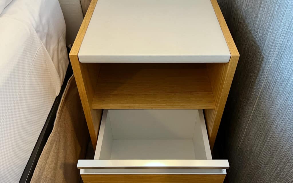 A nightstand in a Veranda Stateroom on Azamara Quest.