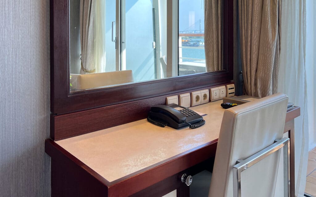 The writing desk in a Veranda Stateroom on Azamara Quest.