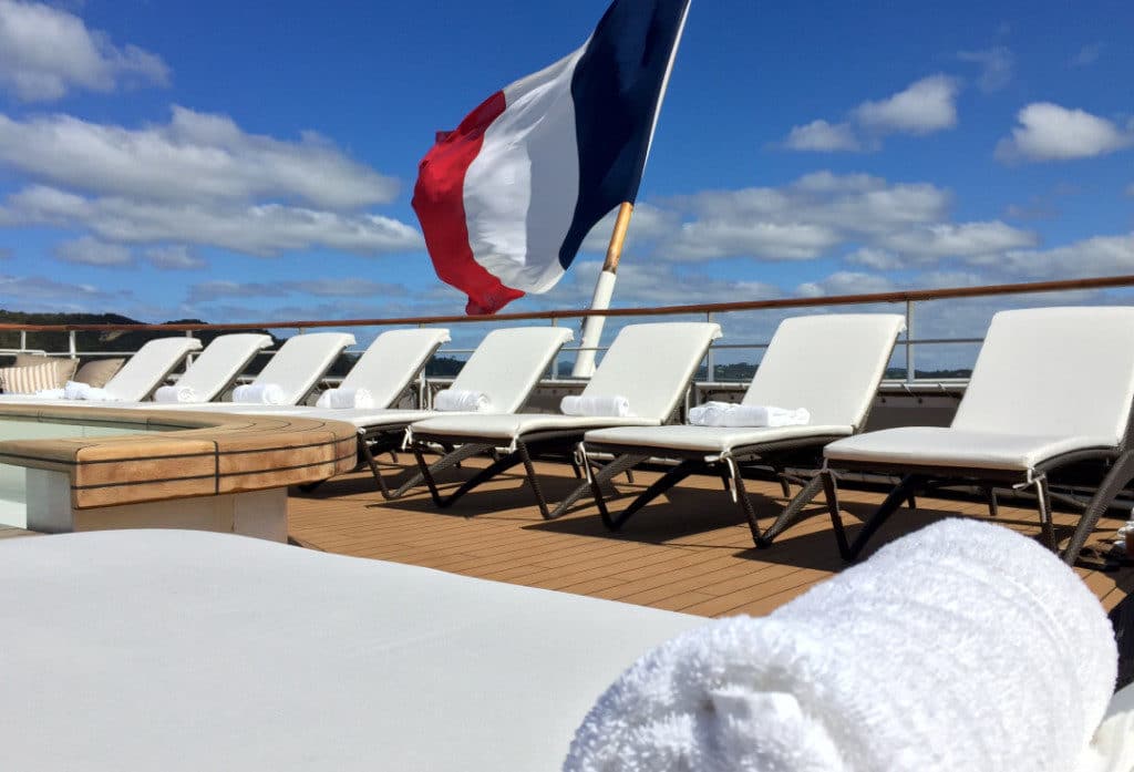 Luxurious padded sun loungers on board Ponant L'Austral.