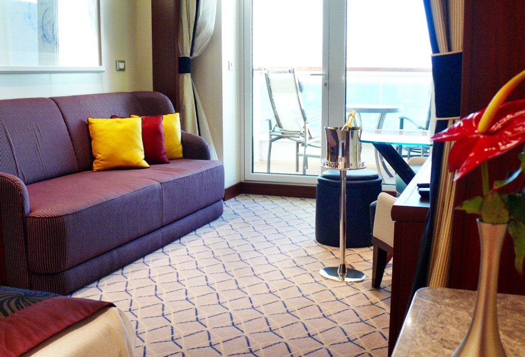 The elegant living space in the Veranda Suite on Seabourn Encore.