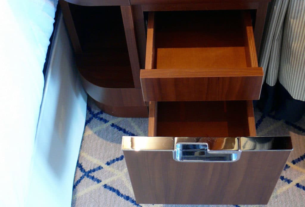 Ingenious dual compartment bedside draws.