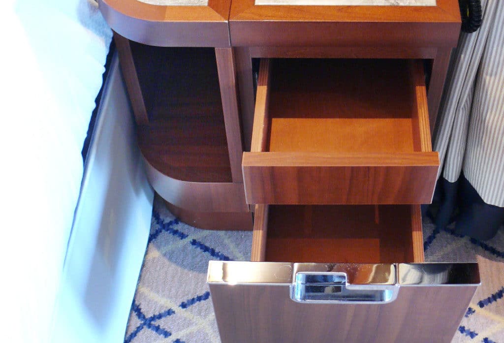 Ingenious dual compartment bedside draws.