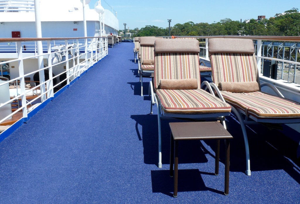 The jogging track sports a smart blue turf.