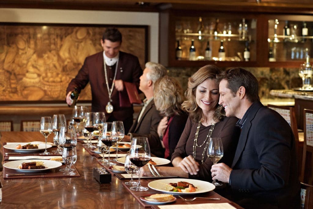 Diners enjoy the experience in La Reserve restaurant on Oceania Cruises.