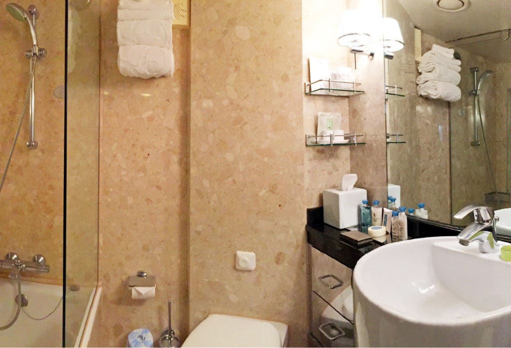 The Penthouse Suite bathroom has a combined bath & shower.