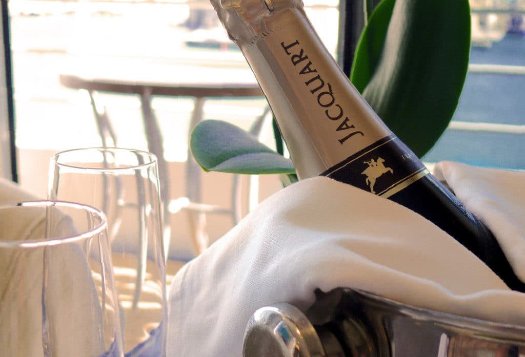 Nautica Penthouse Suite guests enjoy complimentary Champagne on embarkation.