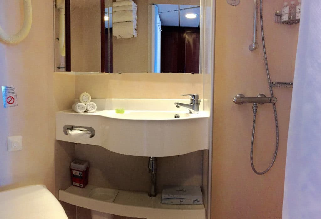 The bathroom in the Nautica Veranda Stateroom is compact yet functional.