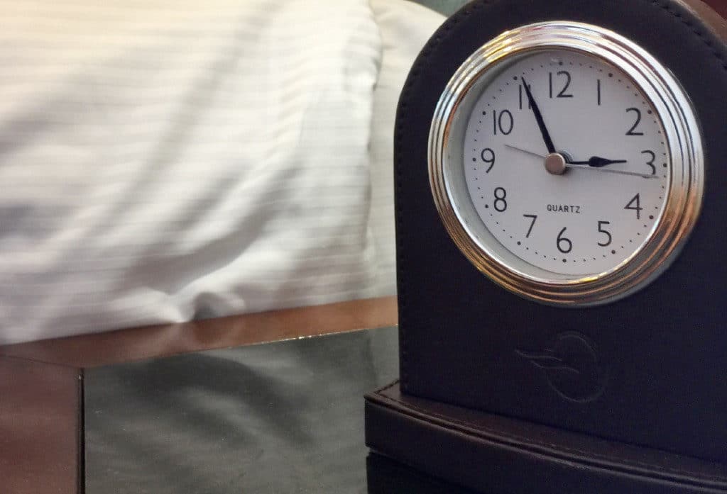 There is a handy bedside clock in every Nautica Veranda Stateroom.