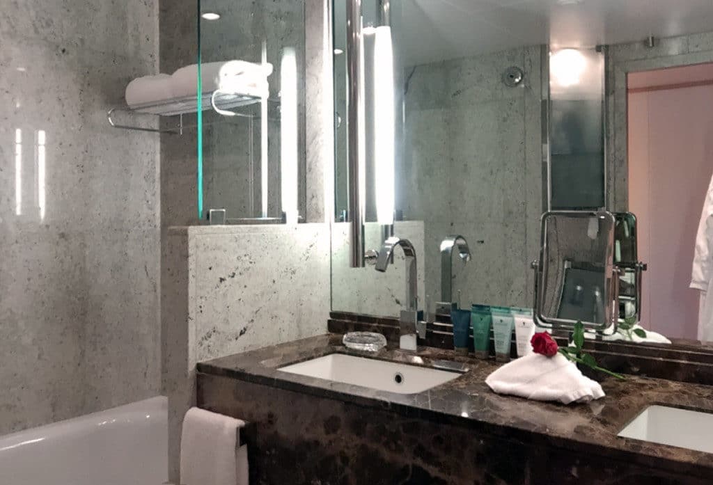 The large marble bathroom really impresses.