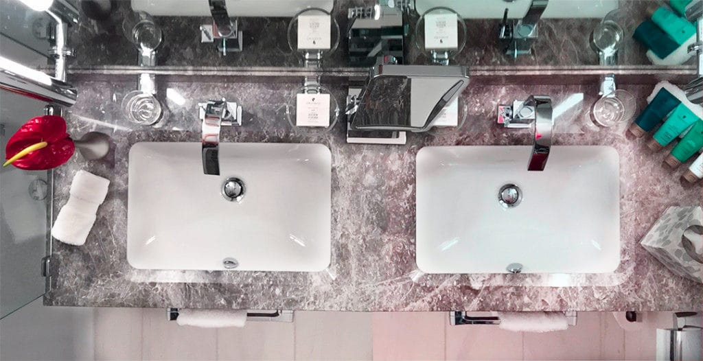 There is lots of storage space around the double vanity.
