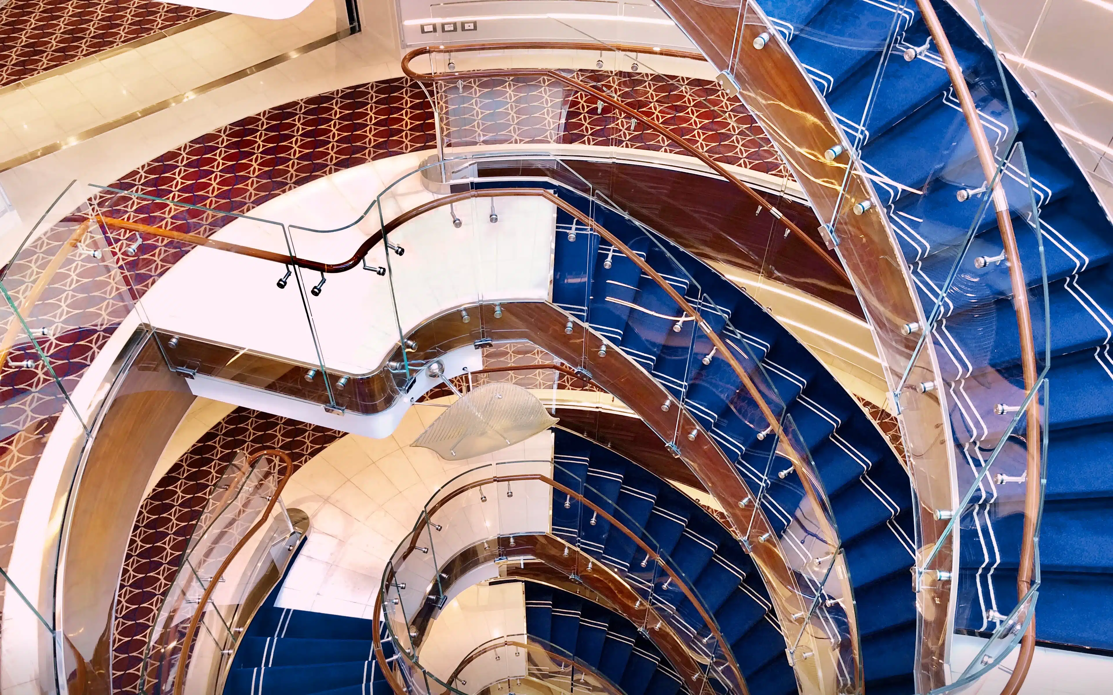 A spiral staircase onboard Seabourn Ovation.