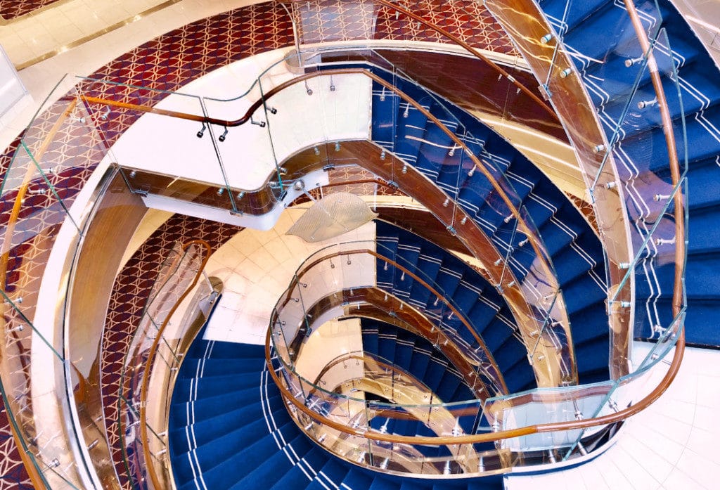 The artfully designed staircase on Seabourn Ovation.