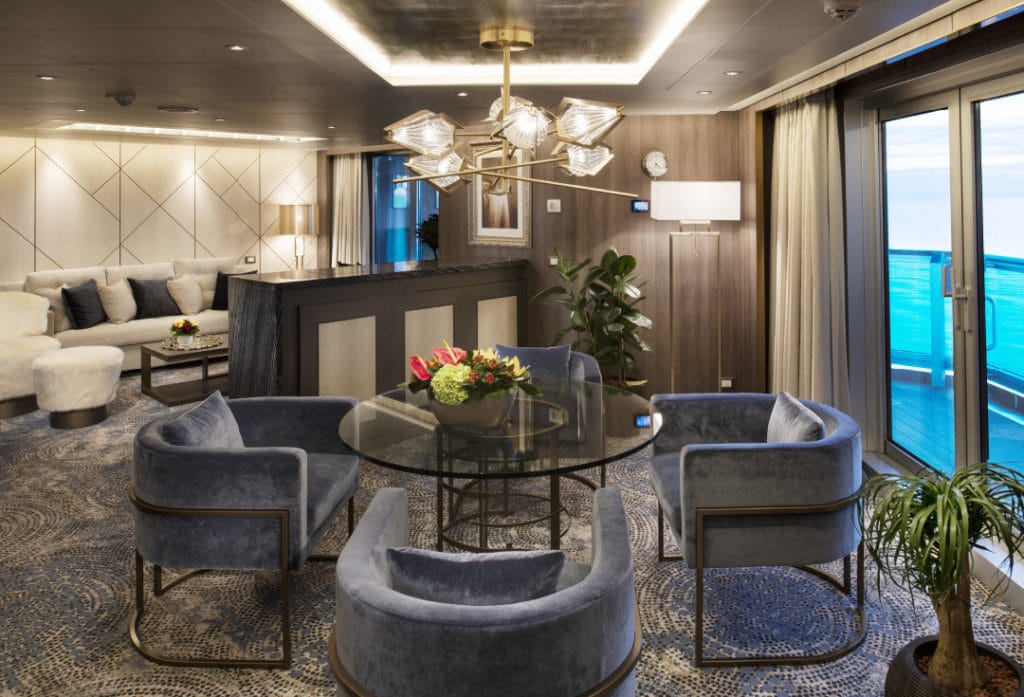 The sumptuous living room in a Nieuw Statendam Pinnacle Suite.