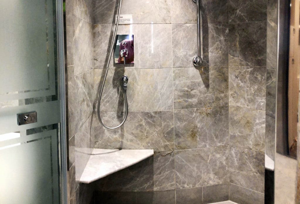 The walk-in rainwater shower even has a seat.