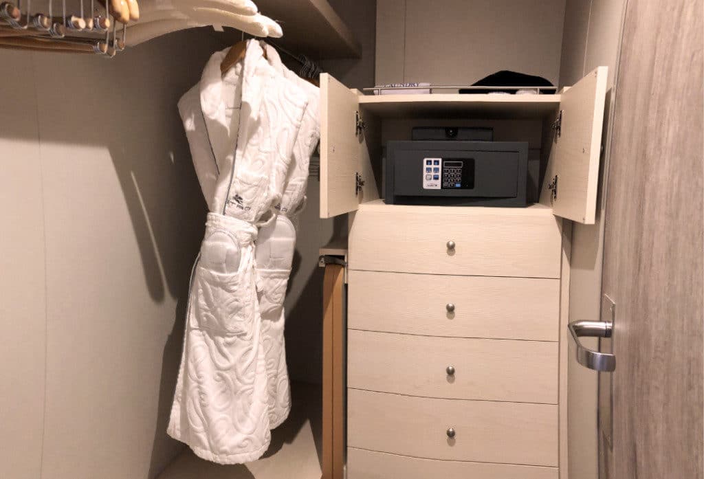 The walk-in closet has lots of hanging space.