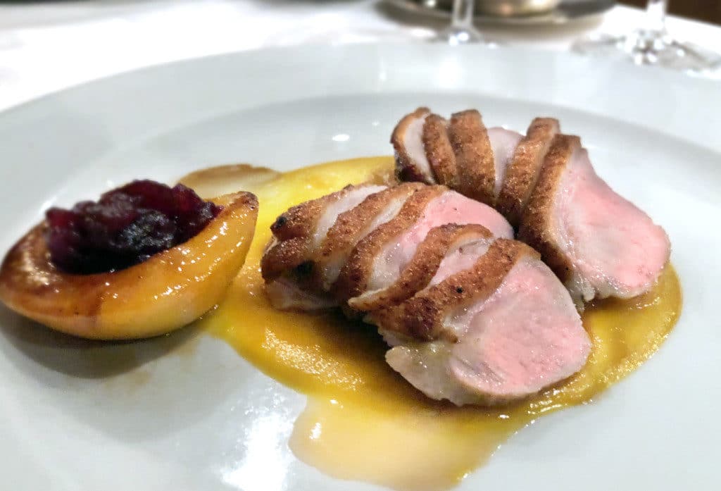 Roasted Duck Breast with sweet roasted peach as served in the Grand Dining Room.