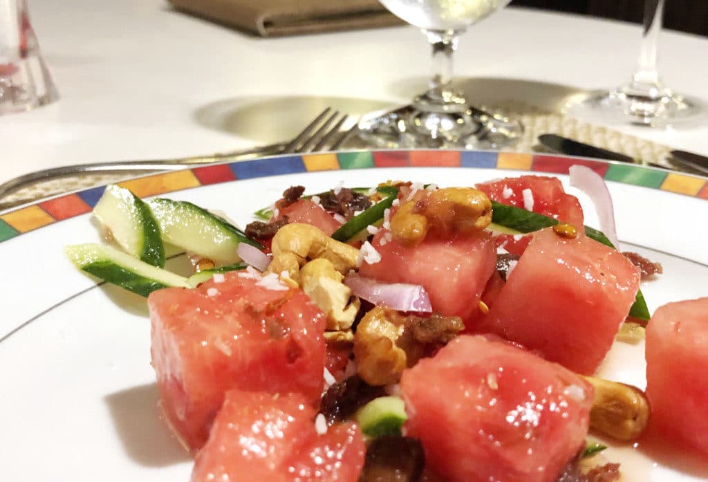 Red Ginger Evenings onboard Regatta showcase dishes like Duck & Watermelon Salad.