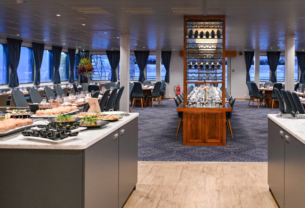 The main dining room on Coral Adventurer.