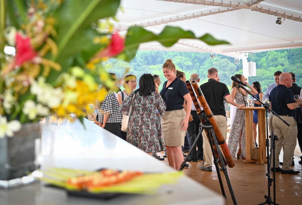 Guests celebrate the launch of the new Coral Adventurer in Singapore.