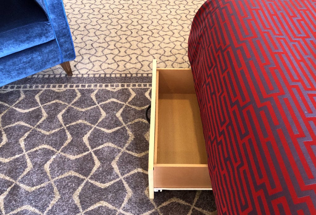 Handy drawers under the bed are ideal for bulky cold weather clothes.