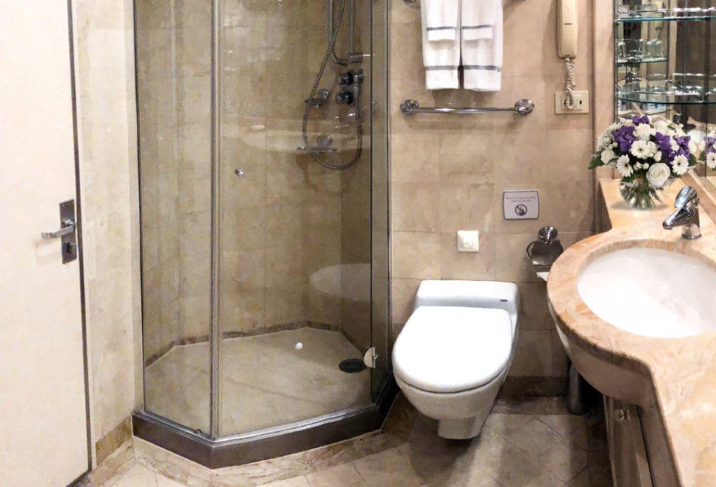 The bathroom has a separate shower.