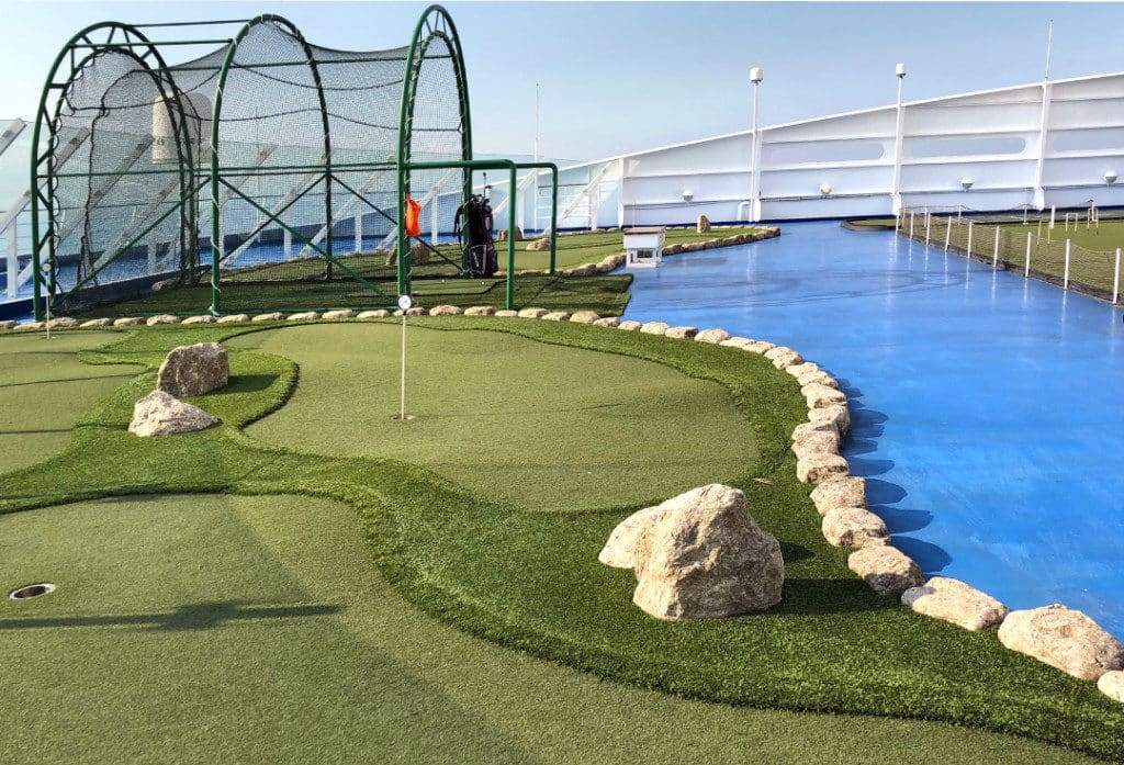 The putting green and golf nets on Seven Seas Voyager.