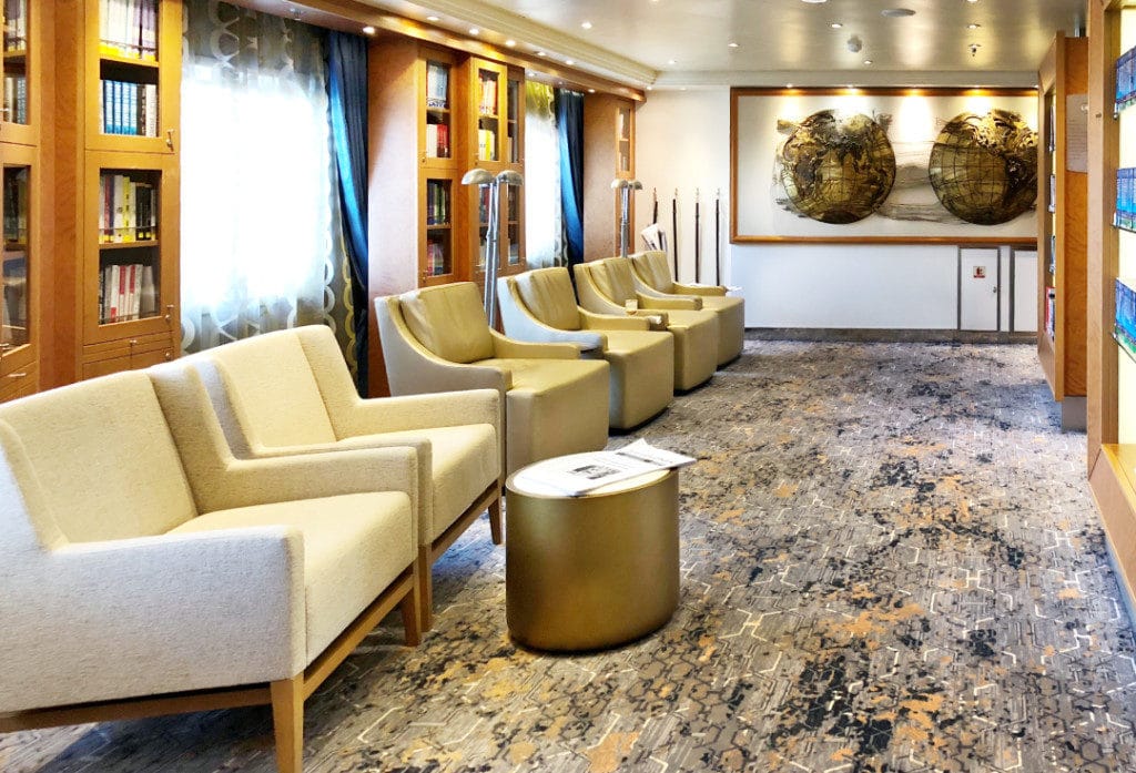 The Seven Seas Voyager library is well stock with books and newspapers.