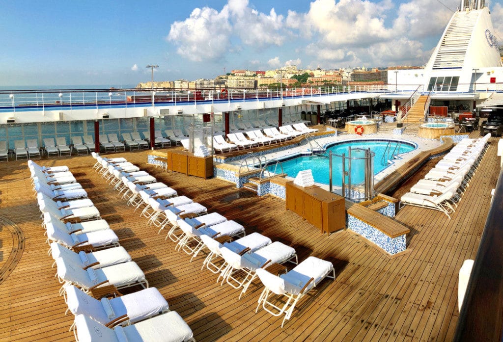 The Seven Seas Voyager pool is a sun-drenched oasis.