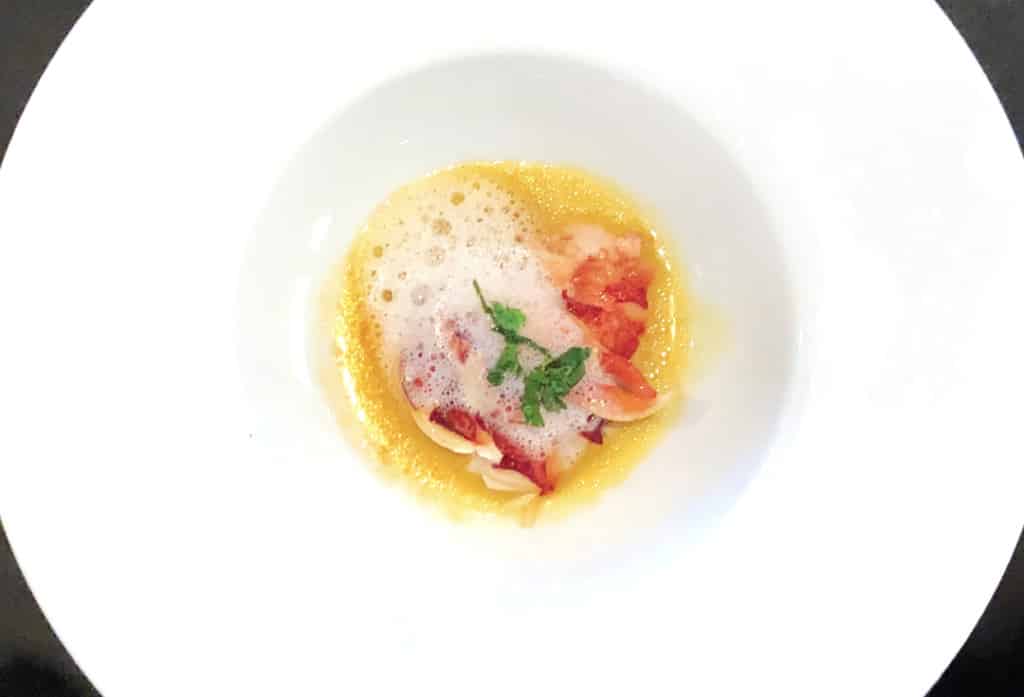 Brittany Blue Lobster in Yellow Curry Broth as served in La Reserve on Oceania Riviera.