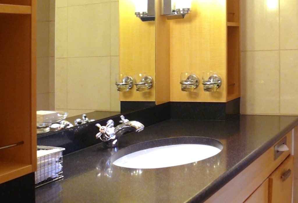 There is plenty of space on the bathroom vanity top.