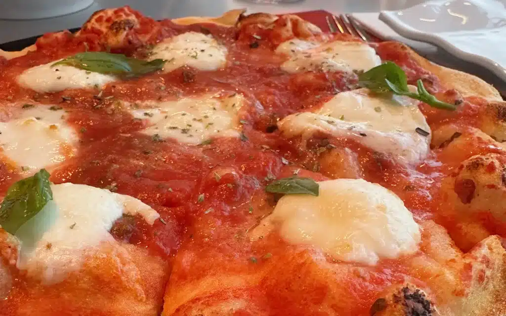 Bufalina Pizza with San Marzano Tomatoes, Mozzarella di Bufala, and Fresh Basil.