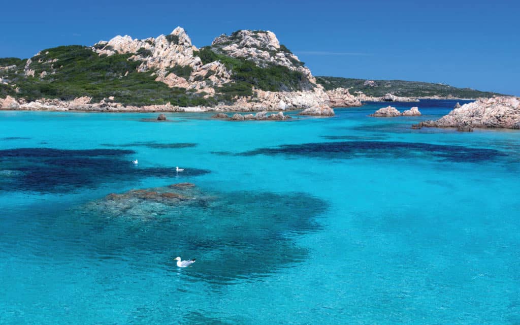 The crystal clear waters of Sardinia, Italy.
