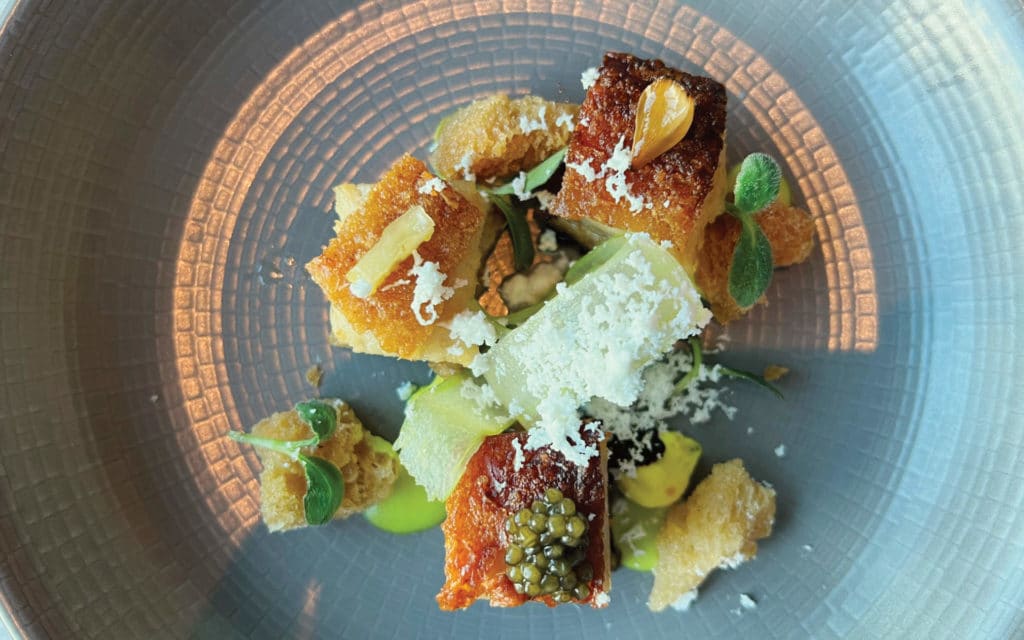 Pork Belly with Madras Curry, Green Pea, Caviar & Goats Cheese as served in Taste of De Librije.