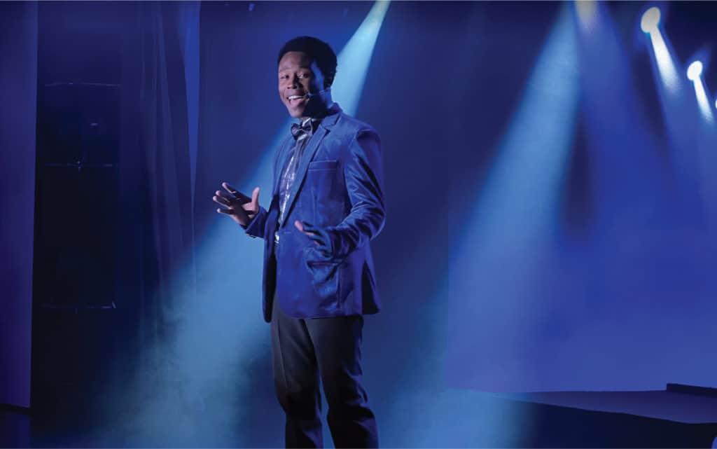 A cast member performs on Oceania Nautica.