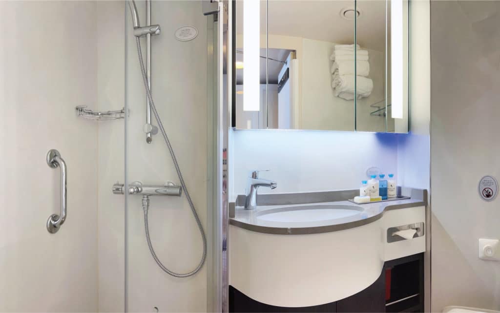 The bathroom in a Oceania Nautica Veranda/Concierge Stateroom.