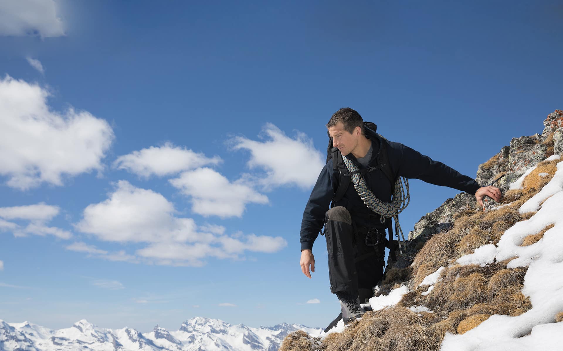 Bear Grylls on a mountain.