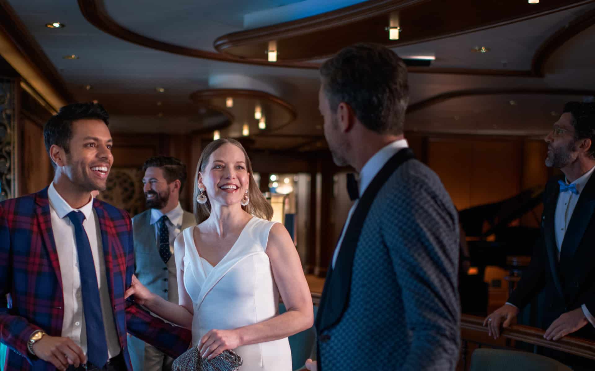 A couple in Gala attire, which is part of the Cunard dress code.