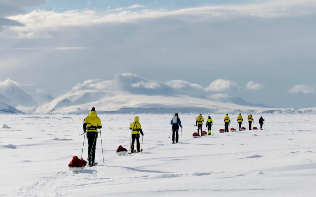 Teams from Ponant trek across the frozen Greenland wilderness.
