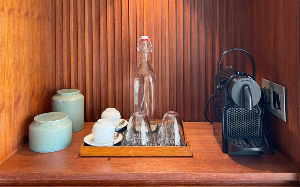 A coffee machine inside an Aqua Mekong suite.