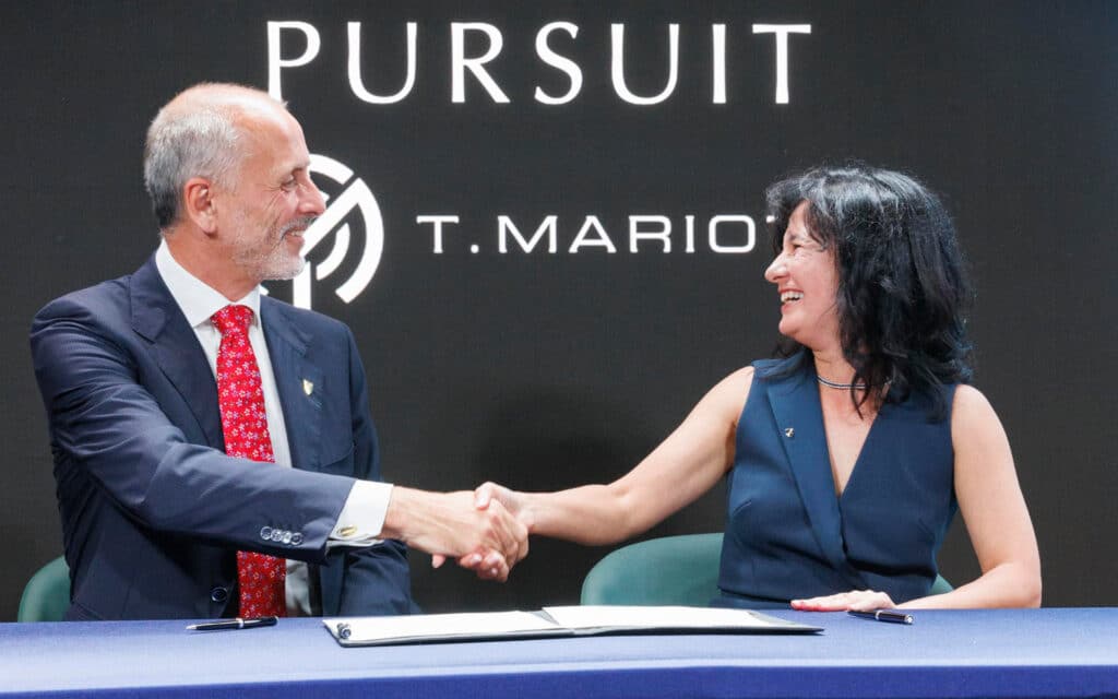 Marco Ghiglione, managing director, T. Mariotti Shipyard and Natalya Leahy, president of Seabourn sign documents to complete the handover of Seabourn Pursuit, the line’s second ultra-luxury expedition ship.