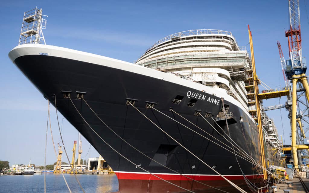 Queen Anne moored alongside in the fitout basin at the Fincantieri shipyard near Venice, Italy.