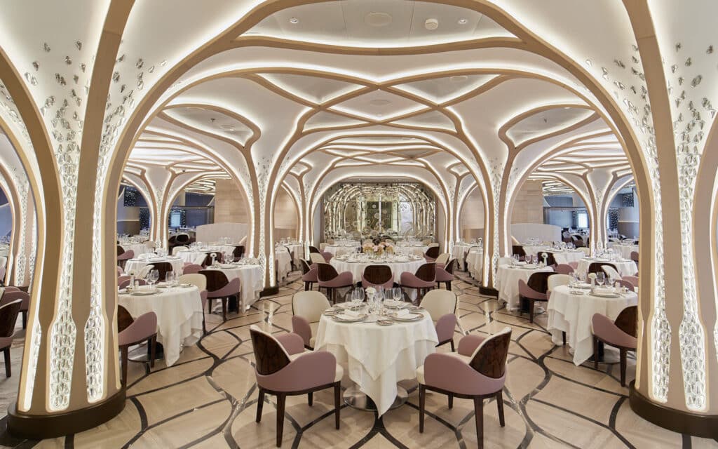 The ornate Compass Rose restaurant on Seven Seas Grandeur.