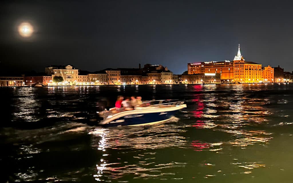 A speed boat on the Giudecca Canal in Venice, Italy
