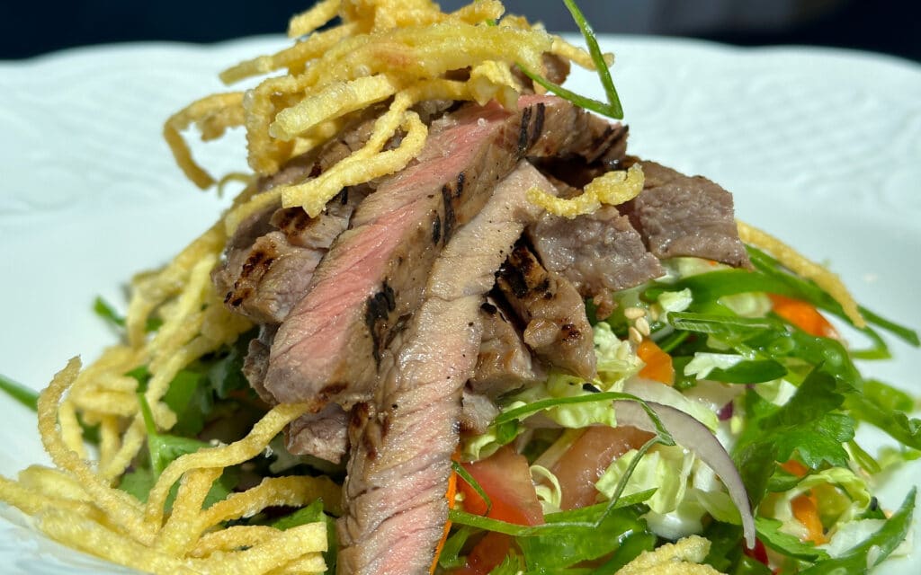 Thai Beef Salad with Crispy Greens & Asian Vegetables.