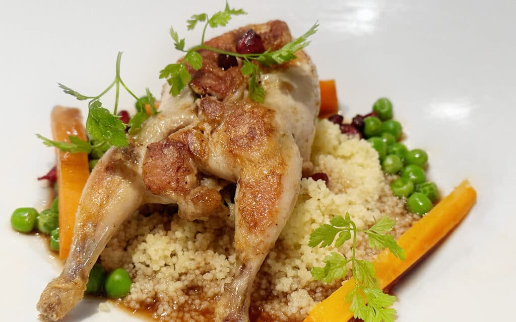 Mushroom & Sausage Stuffed Qual with Herbed Israeli Cous Cous, Caramelized Baby Carrots & Demi-Glaze