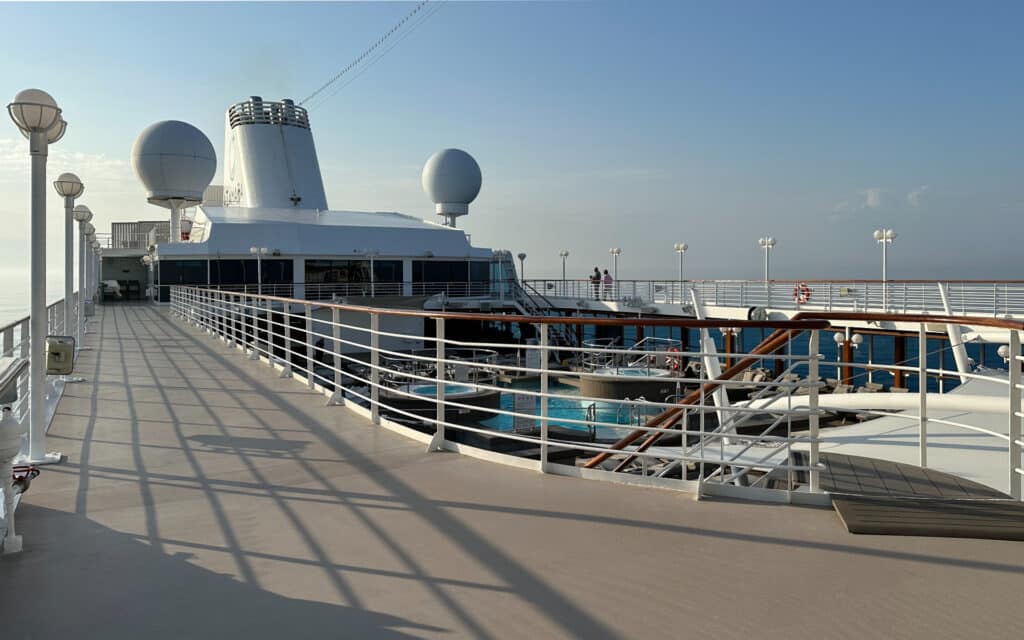 The jogging track has views of the Azamara Pursuit swimming pool.